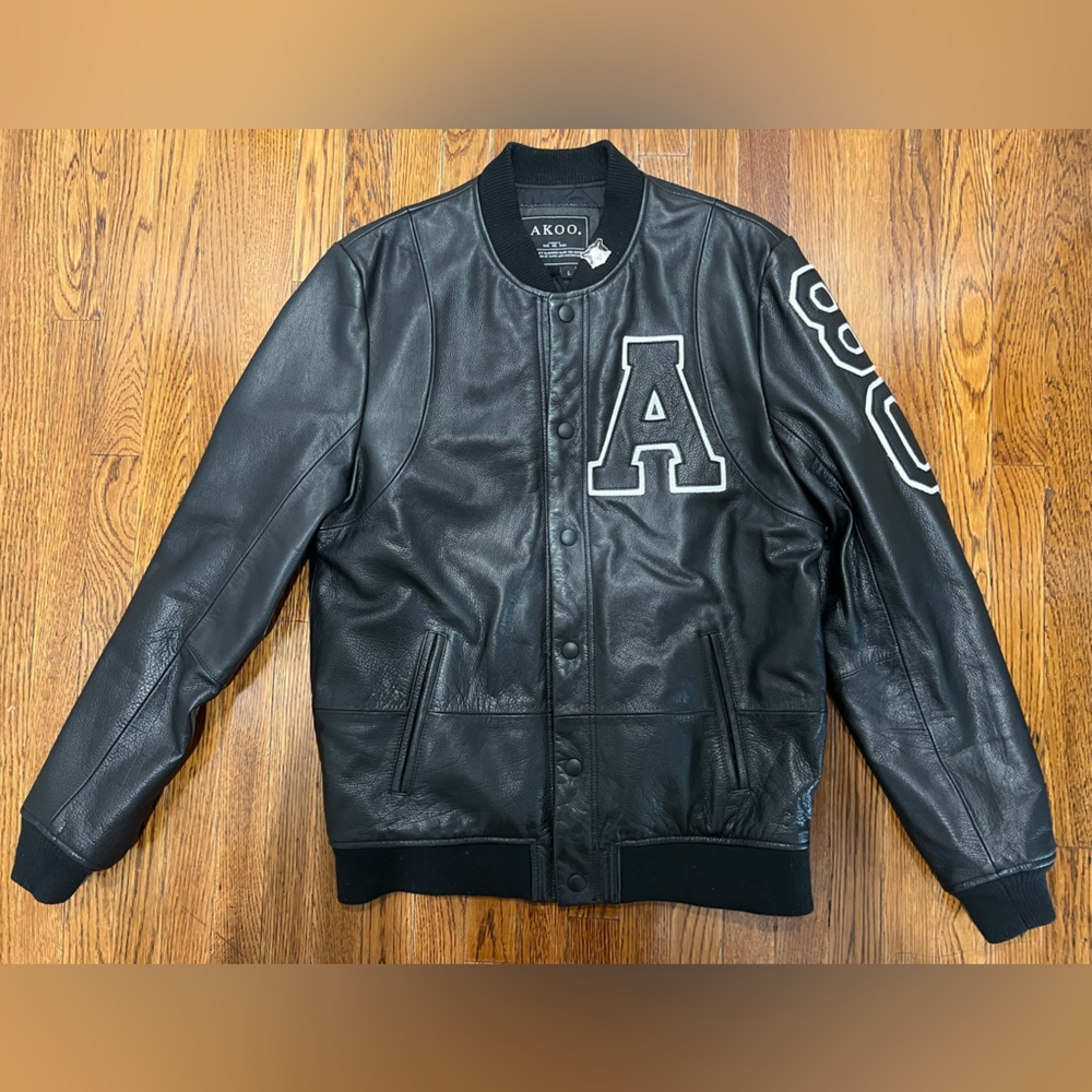 AKOO black leather bomber/varsity jacket brand NWT.